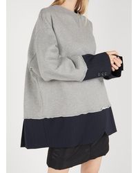 MM6 by Maison Martin Margiela Gespleißtes Sweatshirt - Grau