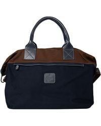 Pockets - Calabrese Lipari Fabric And Leather Medium Bag Navy - Lyst