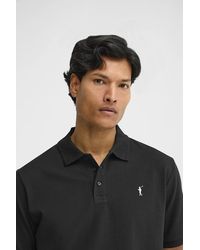 POLO CLUB - Polo Nera A Maniche Corte Con Logo Ricamato Rigby Go - Lyst