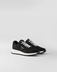 Prada - Sneakers PRAX 1 in Re-Nylon e pelle spazzolata - Lyst