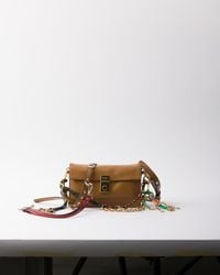 Prada - Soft Sound Small Leather Shoulder Bag With Charms - Lyst