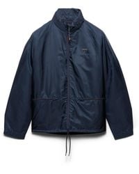 Prada - Chaqueta Con Capucha De Re-Nylon, Hombre, Talla - Lyst