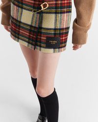 Prada - Plaid Miniskirt With Safety Pin - Lyst