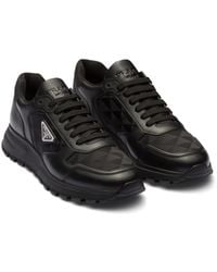 Prada - Re-Nylon Brand-Plaque Leather And Nylon High-Top Trainers - Lyst