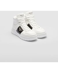 Prada - Padded Nappa Leather High-top Sneakers - Lyst