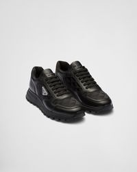 Prada - Leather And Re-nylon High-top Sneakers - Lyst