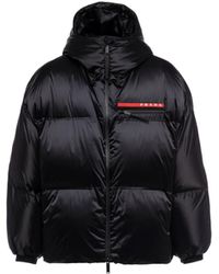 Prada - Oversized Technical Re-Nylon Down Jacket - Lyst