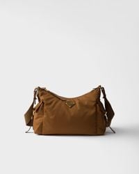 Prada - Explore Large Re-Nylon And Leather Bag - Lyst