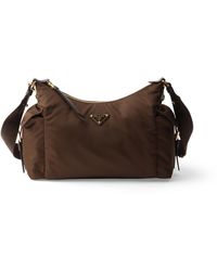 Prada - Explore Large Re-Nylon And Leather Bag - Lyst
