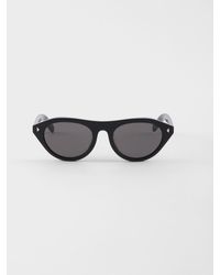 Prada - Sunglasses With The Iconic Metal Plaque - Lyst