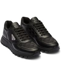 Prada - Leather And Re-Nylon High-Top Sneakers - Lyst