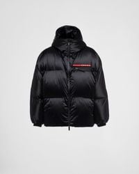 Prada - Oversized Technical Re-Nylon Down Jacket - Lyst
