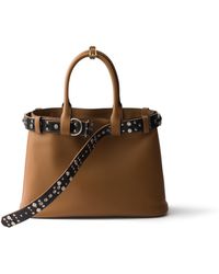 Prada - Buckle Large Leather Bag With Studded Belt - Lyst