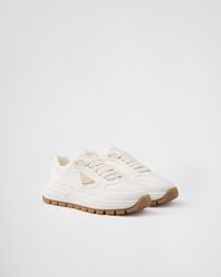 Prada - Leather Triangle Sneakers - Lyst