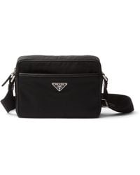 Prada - Bolso messenger con placa del logo - Lyst