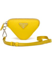 prada logo plaque clutch bolsa