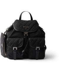Prada - Mittelgroßer Rucksack Aus Gestepptem Re-Nylon Mit Besatz Aus Saffiano-Leder, Damen - Lyst