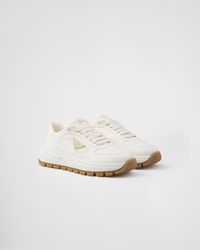 Prada - Leather Triangle Sneakers - Lyst