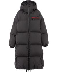 Prada - Oversized Technical Re-Nylon Down Coat - Lyst