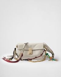 Prada - Soft Sound Small Leather Shoulder Bag With Charms - Lyst