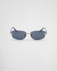 Prada - Sonnenbrille Mit Ikonischer Plakette Aus Metall - Lyst