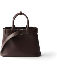 Prada - Buckle Small Leather Handbag With Belt - Lyst