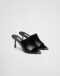 Prada Leather Logo-print Plexiglas High-heel Slides in Silver 