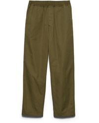 Prada - Triangle-Logo Patch Elasticated Waistband Trousers - Lyst