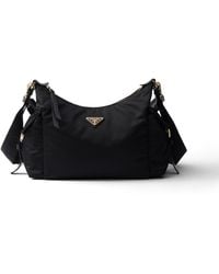 Prada - Explore Large Re-Nylon And Leather Bag - Lyst