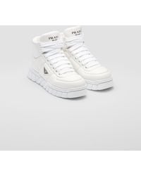 Prada - Padded Nappa Leather High-Top Sneakers - Lyst