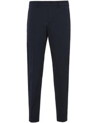 Prada - Stretch Technical Fabric Trousers - Lyst