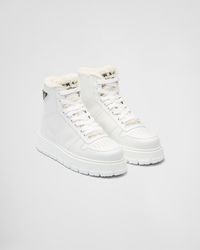 Prada - Leather And Shearling High-top Sneakers - Lyst