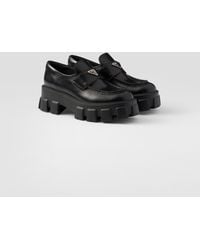 Prada - Monolith Logo-Plaque Patent-Leather Loafers - Lyst