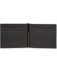Prada Leather Logo-lettering Saffiano Wallet in Black for Men - Save 13% |  Lyst