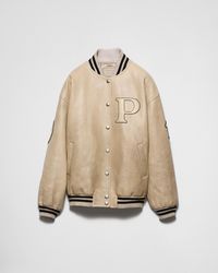 Prada - Bomberjacke Aus Leder Mit Aufnähern - Lyst