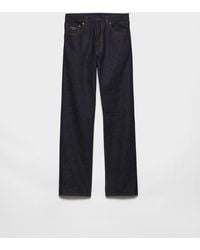 Prada - Reguläre Jeans Aus Raw Denim - Lyst