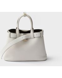 Prada - Buckle Small Leather Handbag With Belt - Lyst