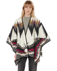 Poncho en laine à imprimé patchwork Laines Etro en coloris Marron Femme Vêtements Sweats et pull overs Ponchos et robes poncho 