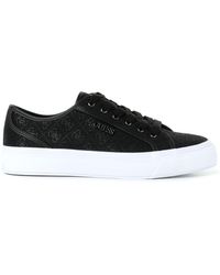 Guess - Baskets en toile à logo - Lyst