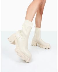 Public Desire - Everdeen Ecru Pu And Knit Chunky Heeled Platform Sock Ankle Boots - Lyst