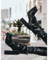 ablaze white flame detail platform block heeled ankle boots