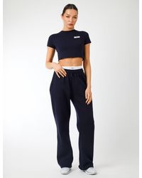 Public Desire - Kaiia Label Logo Exposed Waistband Wide Leg Joggers Navy - Lyst