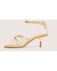Public Desire - Nora Wide Fit Gold Pu Lace Up Strappy Mid Heels - Lyst