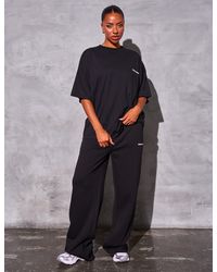 Public Desire - Kaiia Studio Logo Wide Leg Joggers Black - Lyst