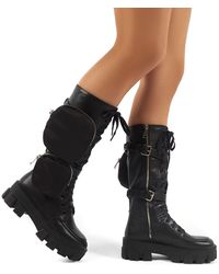 public desire intention chunky calf boot with pouch in black