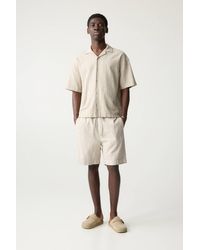 Pull&Bear - Gestreifte Jogger-Bermudashorts Mit Leinenanteil - Lyst