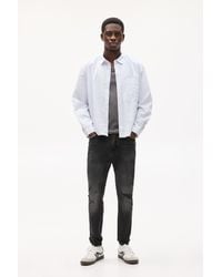 Pull&Bear - Ripped Carrot Fit Jeans - Lyst