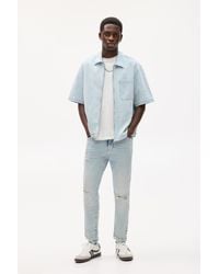 Pull&Bear - Ripped Carrot Fit Jeans - Lyst