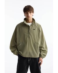 Pull&Bear - Lightweight Stwd Pouch Pocket Raincoat - Lyst