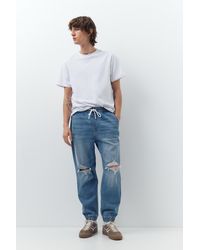 Pull&Bear - Joggerhose Aus Denim Mit Rissen - Lyst